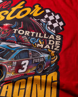 Taco Gear Al Pastor Racing t-shirt with colorful taco-themed racecar graphic, devil driver, and bold “Tacos de Trompo” and “Racing” text on navy and red tees.
