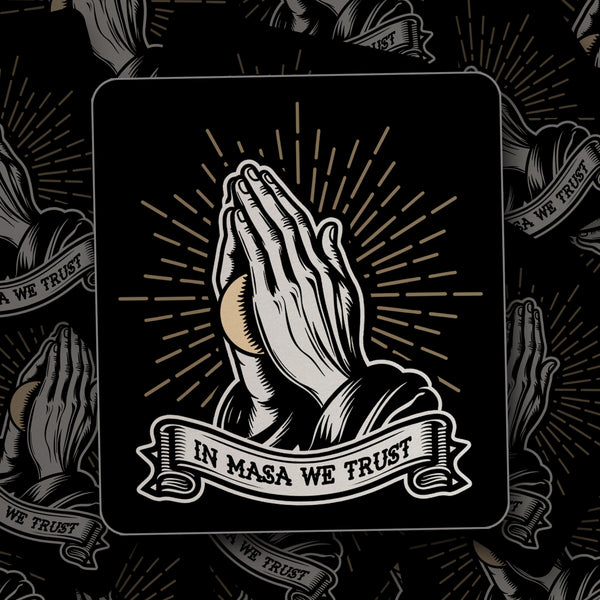 in masa we trust sticker showing praying hands with a masa ball in beween from taco gear
